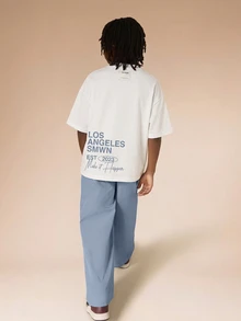 SUMWON Conjunto de camiseta y pantalón jogger a juego de dos piezas de estilo urbano de Los Ángeles para niños de talla grande - Azul - Ver 1