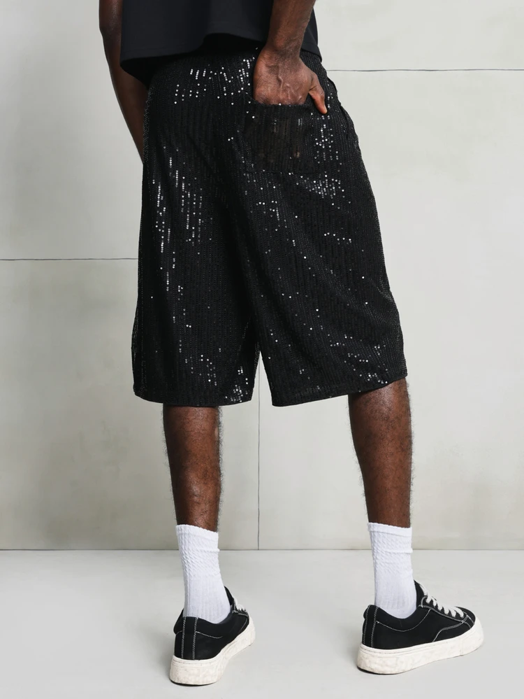 Jorts noirs à paillettes pour hommes, longueur genoux, coupe ample avec jambes larges, parfaits pour les soirées et événements festifs