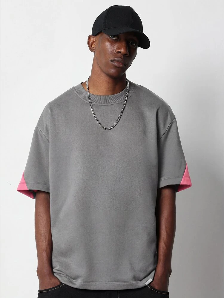 T-shirt oversize da uomo con maniche corte, dettagli a blocchi di colore rosa, collo a equipaggio, casual, streetwear, moda urbana