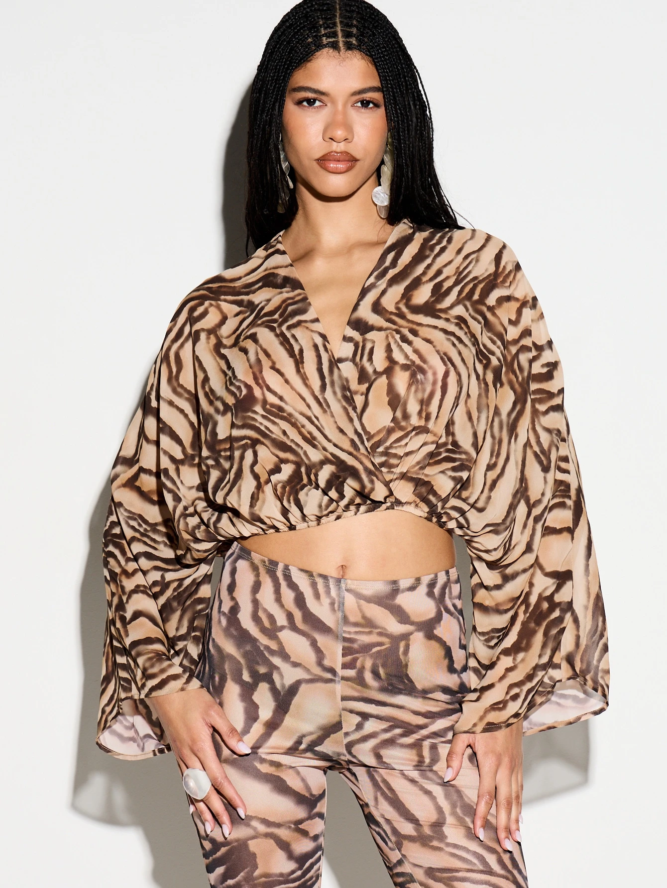 KIZN Tiger Print Twist Front Batwing Blouse