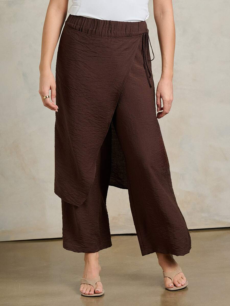 Rouah Quần nữ dáng suông, chất liệu crepe dệt họa tiết, cạp chun, thiết kế bất đối xứng, phối thêm chi tiết áo choàng, ống rộng, màu nâu espresso, phong cách avant-garde sang trọng, thích hợp cho bữa tối mùa xuân hè. - Cà phê nâu - Xem 1