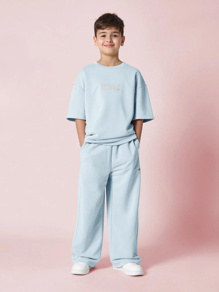 Boys Oversized Light Blue T Shirt And Wide Leg Pants Coordinated Set With Make It Happen Text Print