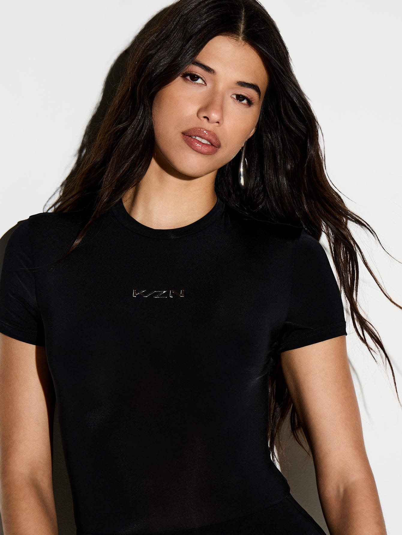 KIZN Black Mesh Long Sleeve Bodysuit