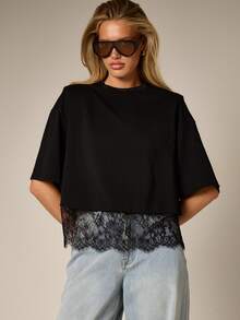 AiiRZ Lace Trim Oversized Black T-Shirt With Shoulder Pads And Decorative Floral Hem Detail Contemporary Urban Style Top - Black - View 1