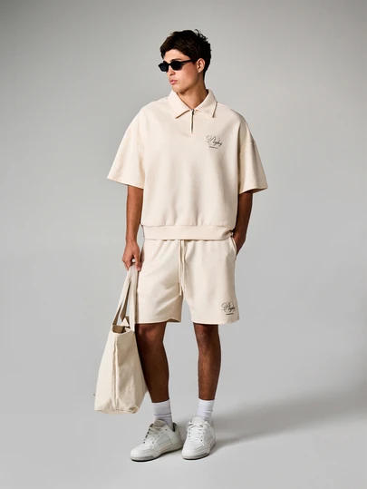 PLAYBOY X SUMWON Relaxed Script Logo Polo Shirt With Quarter Zip Collar Short Sleeve Casual Summer Streetwear Essential