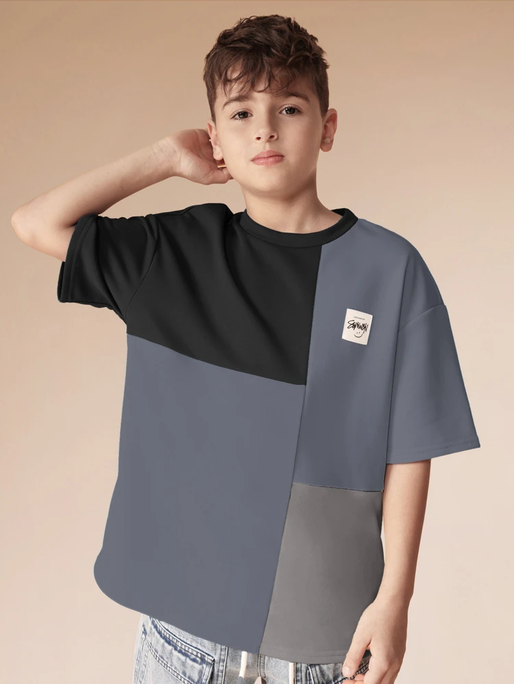 Oversized Color Block Tee With Asymmetrical Design Statement Piece Contemporary Street Style Short Sleeve Top