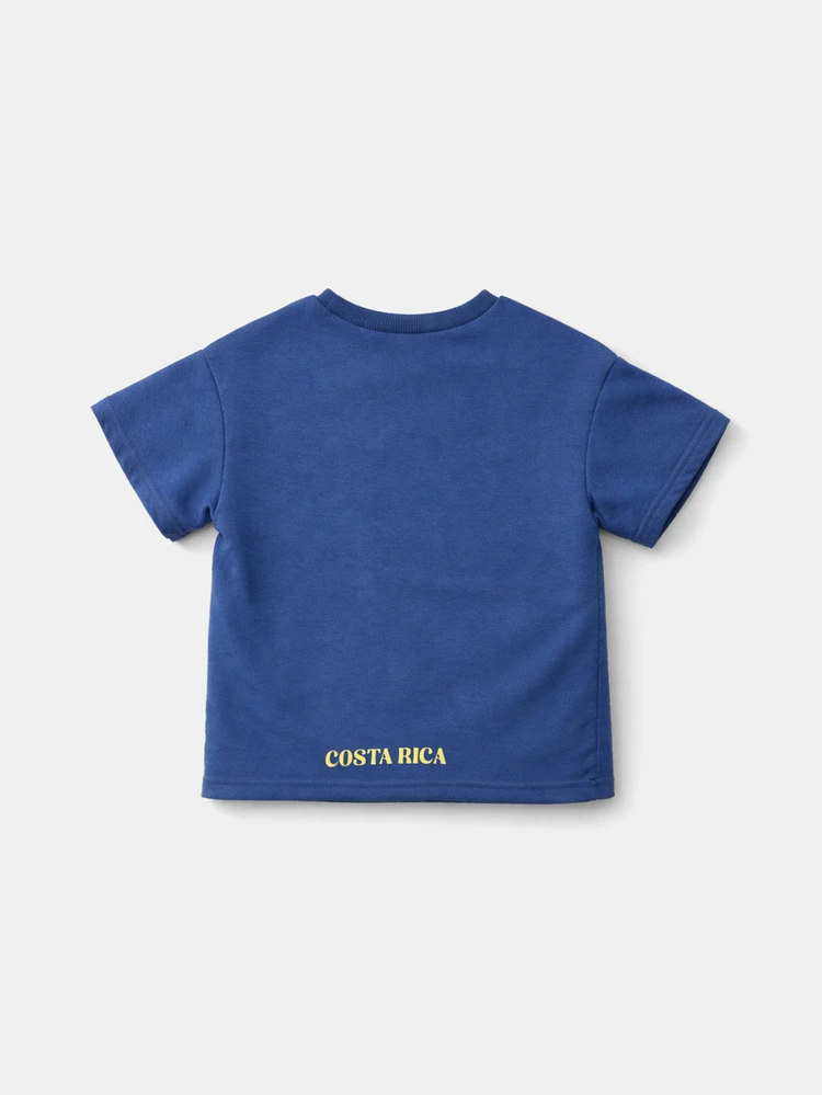 Camiseta de verano de corte regular con cuello redondo, manga corta y estampado de olas en azul desgastado para niños