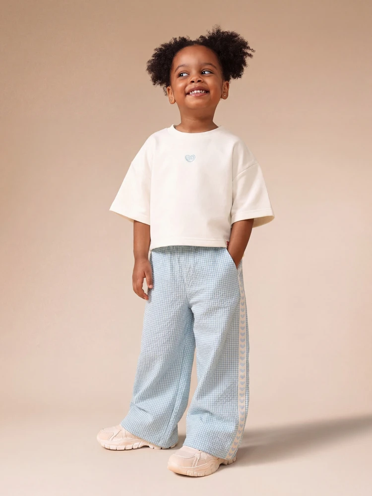 Set coordinato di t-shirt oversize e pantaloni a gamba ampia per ragazze, con stampa grafica di panetteria fresca, outfit casual estivo