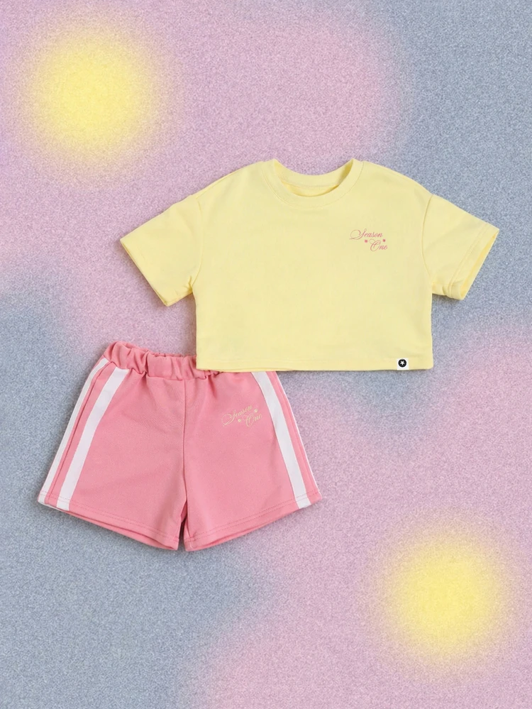Kurzes gelbes T-Shirt und rosa Shorts Set mit Rundhalsausschnitt, Kurzarm und hoher Taille für den Sommer Casual Wear
