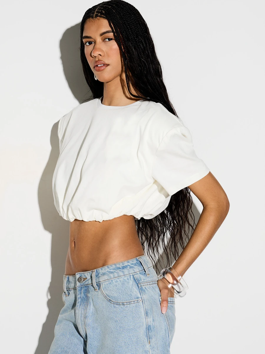 KIZN Áo thun crop top có đệm vai, viền gấu phồng và tay ngắn phồng, kiểu dáng mùa hè không thể thiếu. - trắng - Xem 1