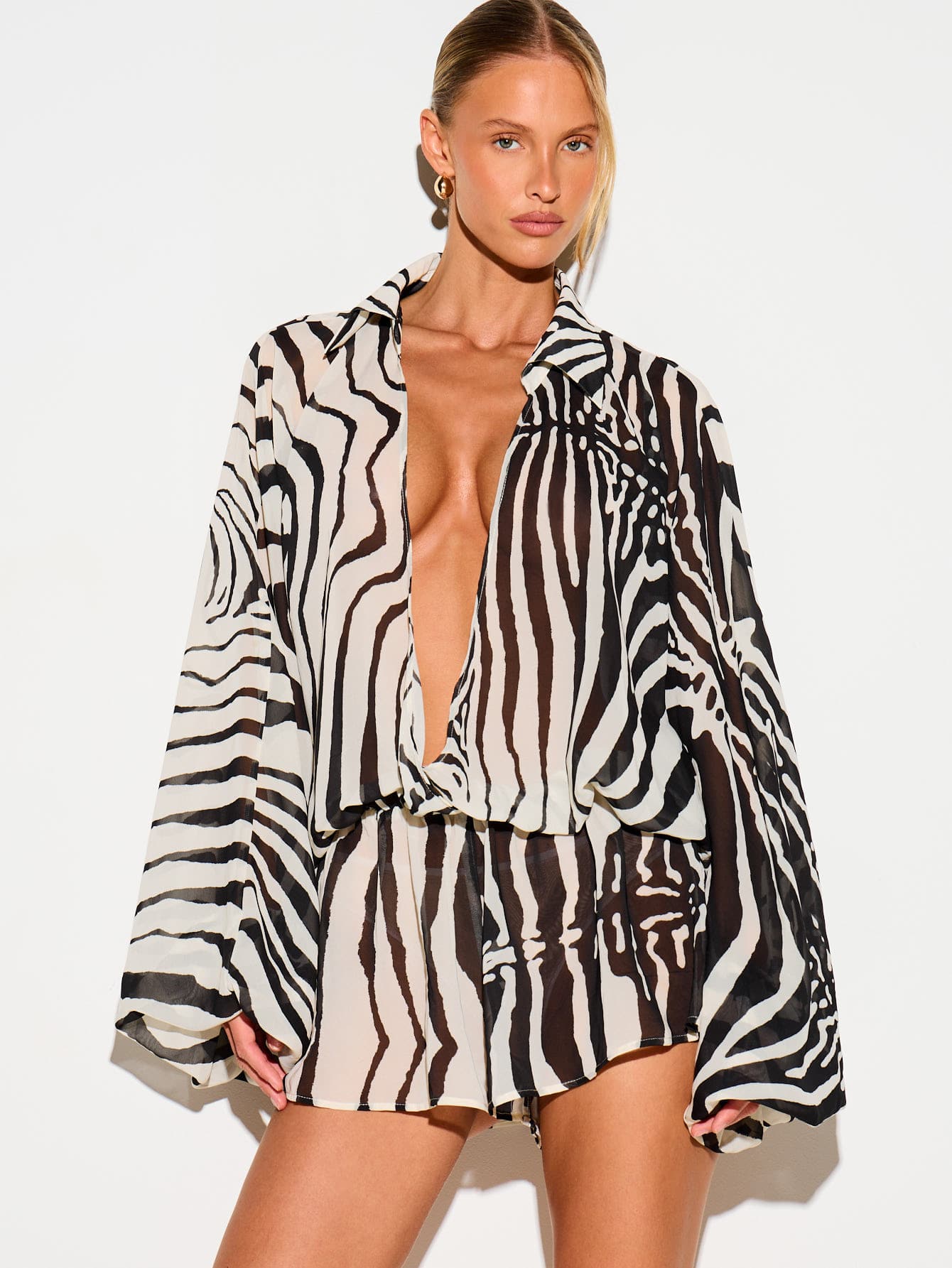 KIZN Zebra Print Deep Plunge Romper With Balloon Sleeves