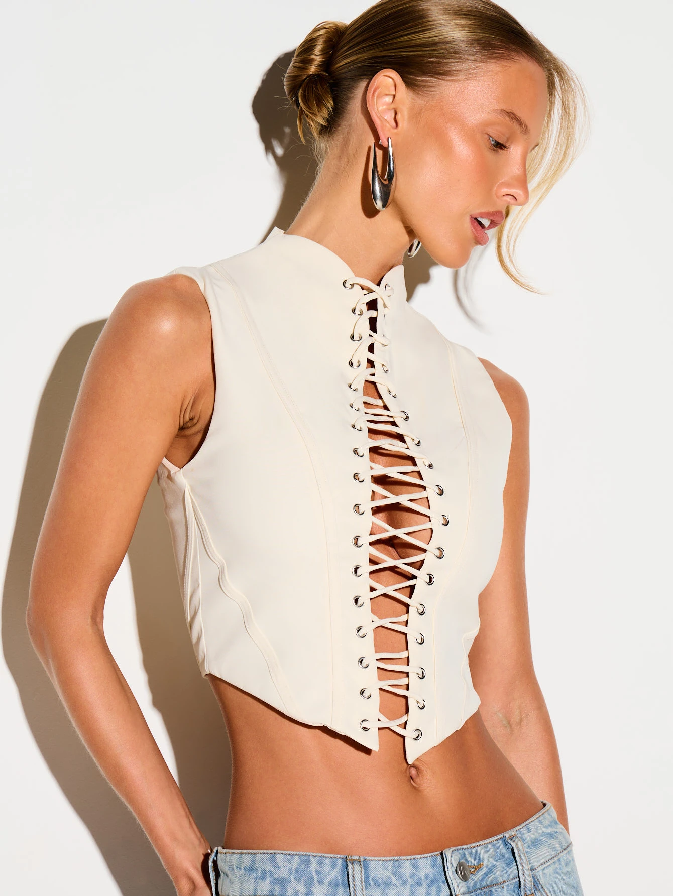 KIZN Sleeveless Lace-Up Corset Crop Top With High Neck