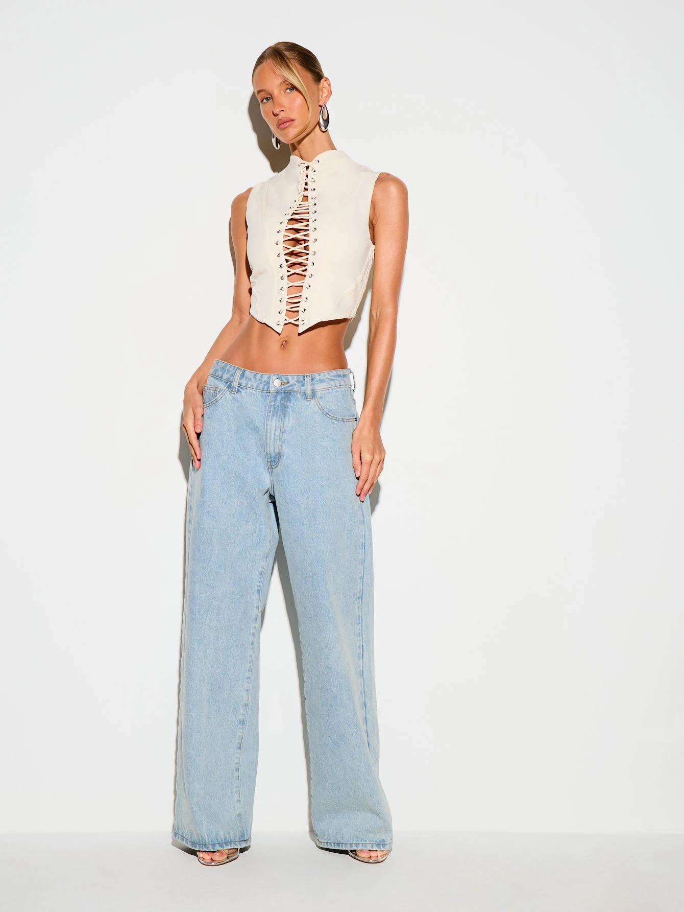KIZN Sleeveless Lace-Up Corset Crop Top With High Neck