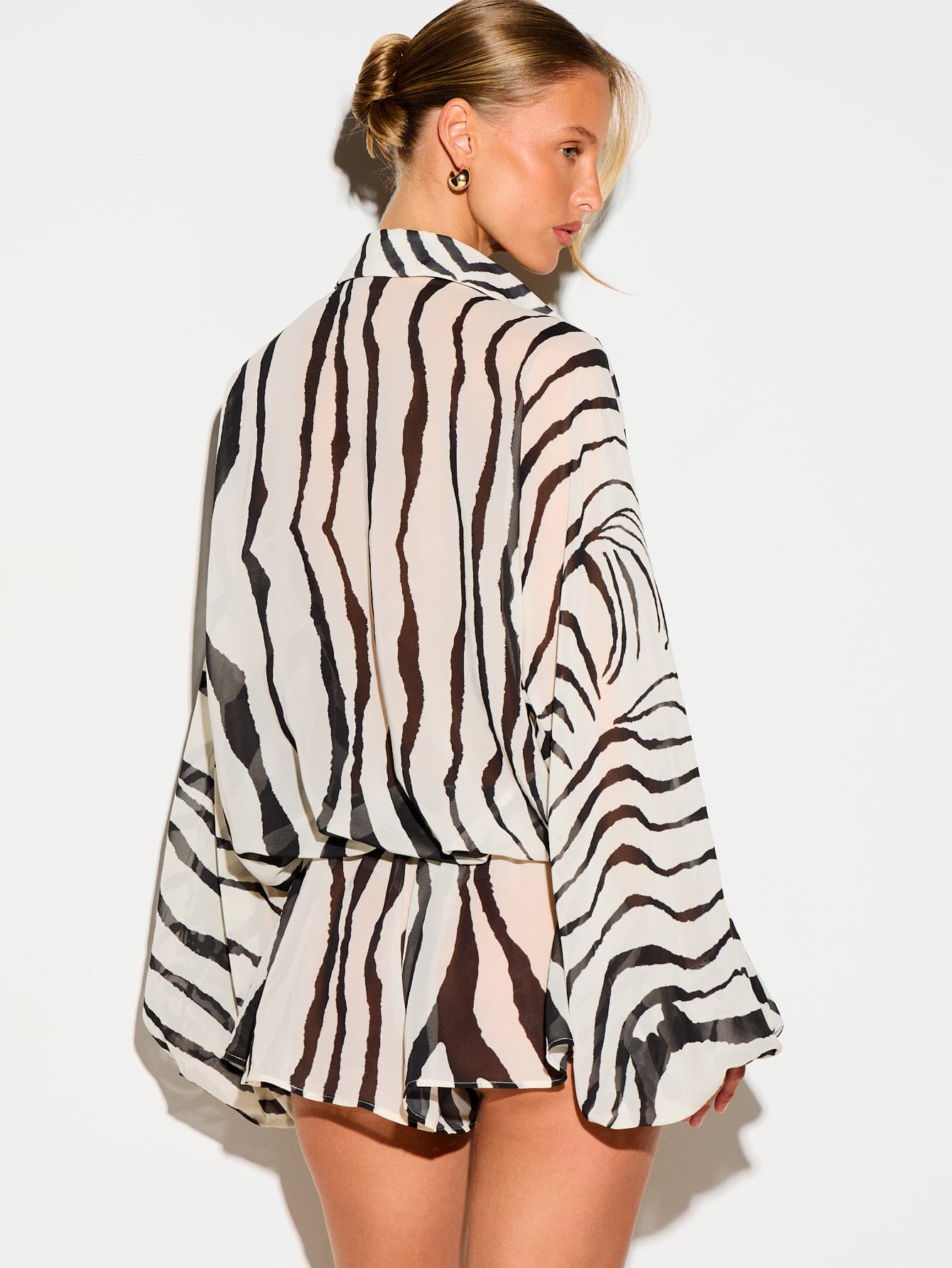 KIZN Zebra Print Deep Plunge Romper With Balloon Sleeves