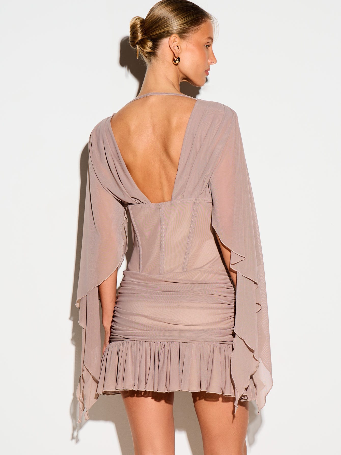 KIZN Corseted Mini Dress With Cape Sleeves And Ruffled Hem