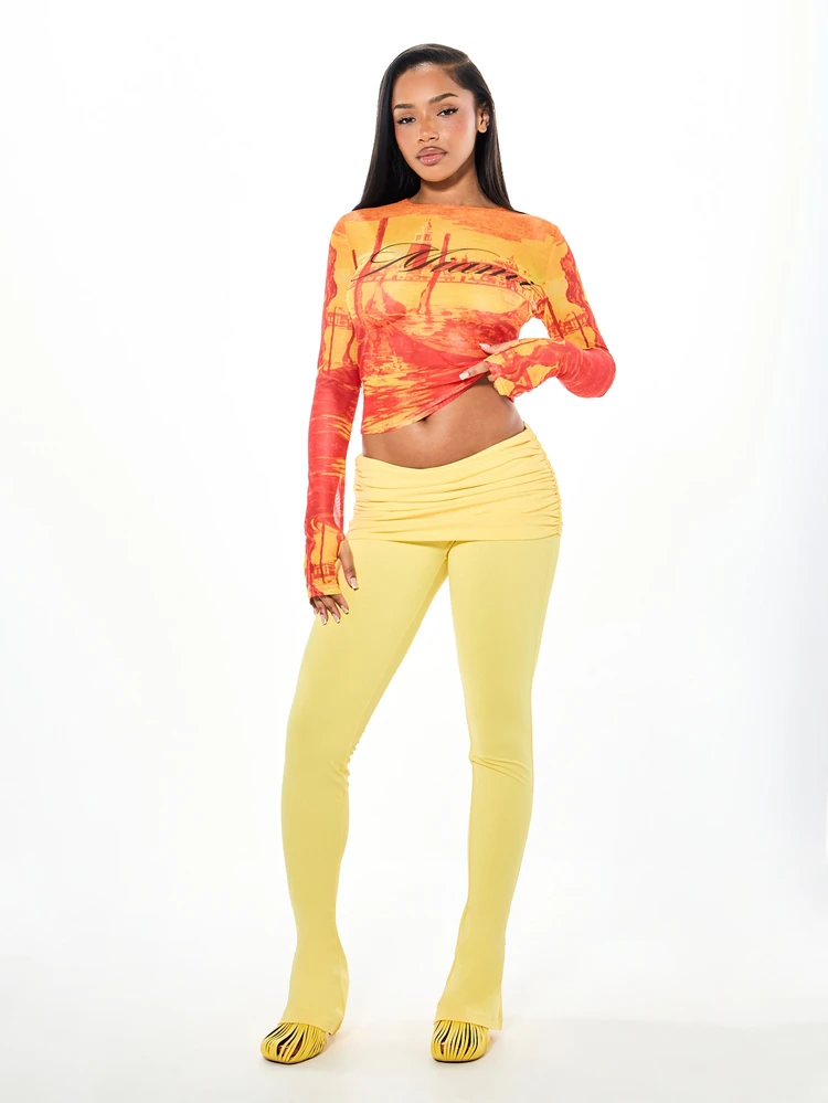 SUMWON WOMEN Slinky Slim Flare Leggings With Ruched Folded Waistband Mini Skirt Overlay Low Rise Flared Leg Full Length