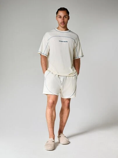SUMWON Conjunto informal de camiseta de cuello redondo y pantalones cortos de ajuste holgado con detalles de puntada de contraste, conjunto de dos piezas de verano