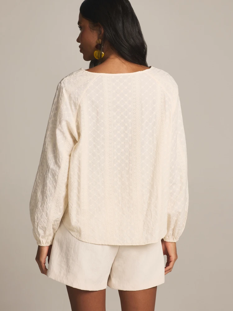 KSTM Gathered Tie-Neck Schiffli Cotton Blouse With Long Puff Sleeves And Textured Geometric Embroidered Design For Spring Summer