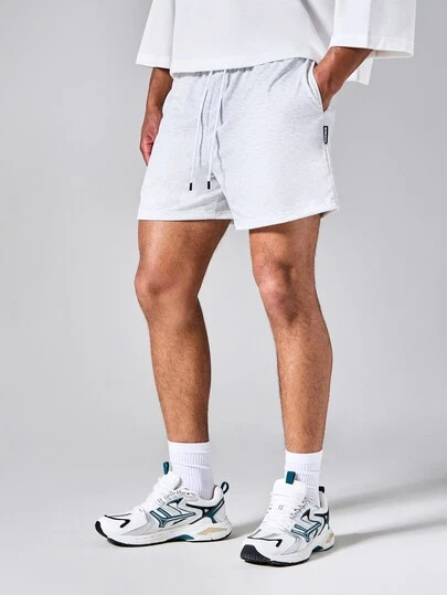 SUMWON Casual Drawstring Waist Marl Knit Shorts With Side Pockets And Brand Tab Detail For Summer