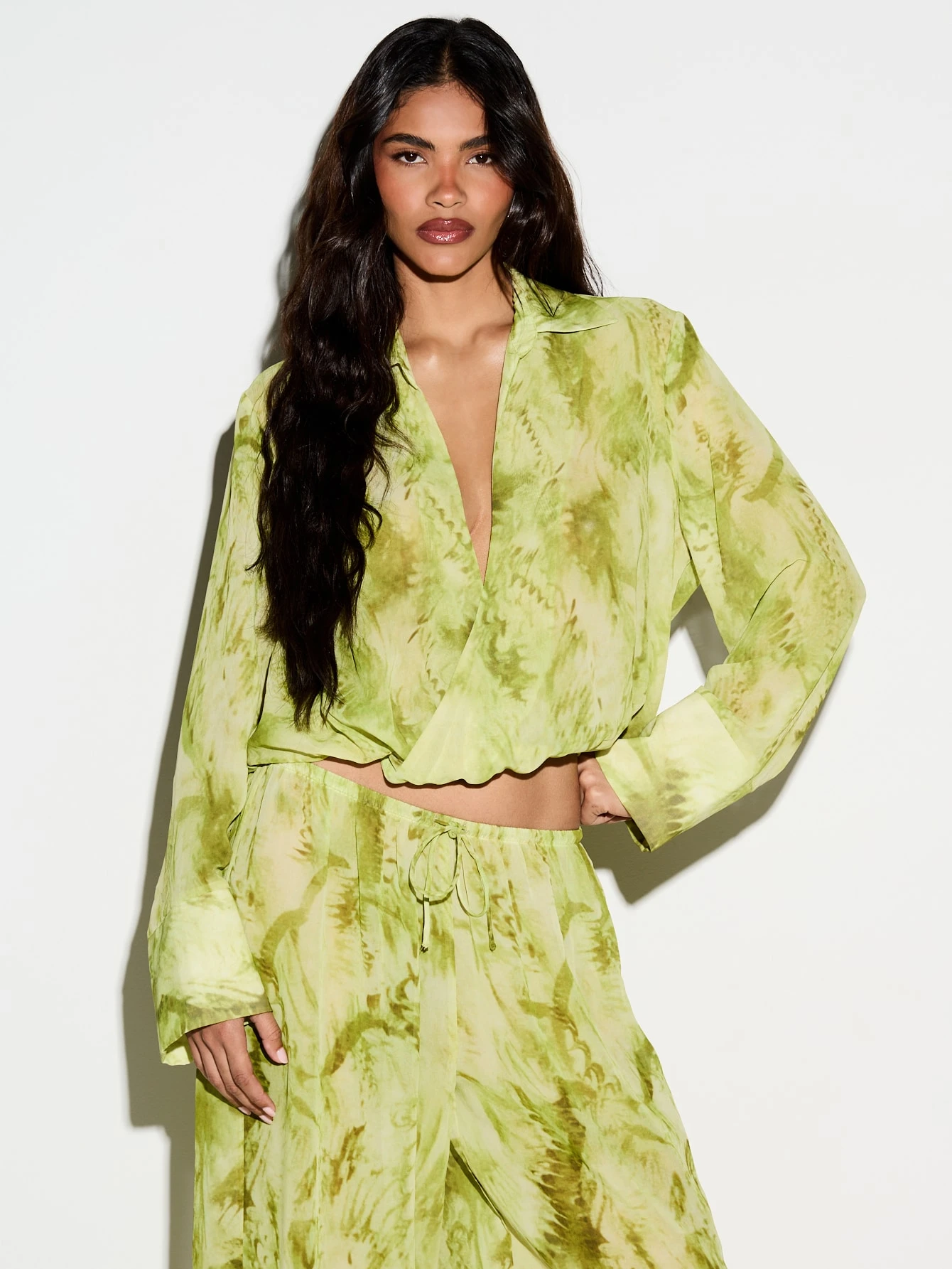 KIZN Abstract Printed Drape Plunge Crop Shirt With Bell Sleeves