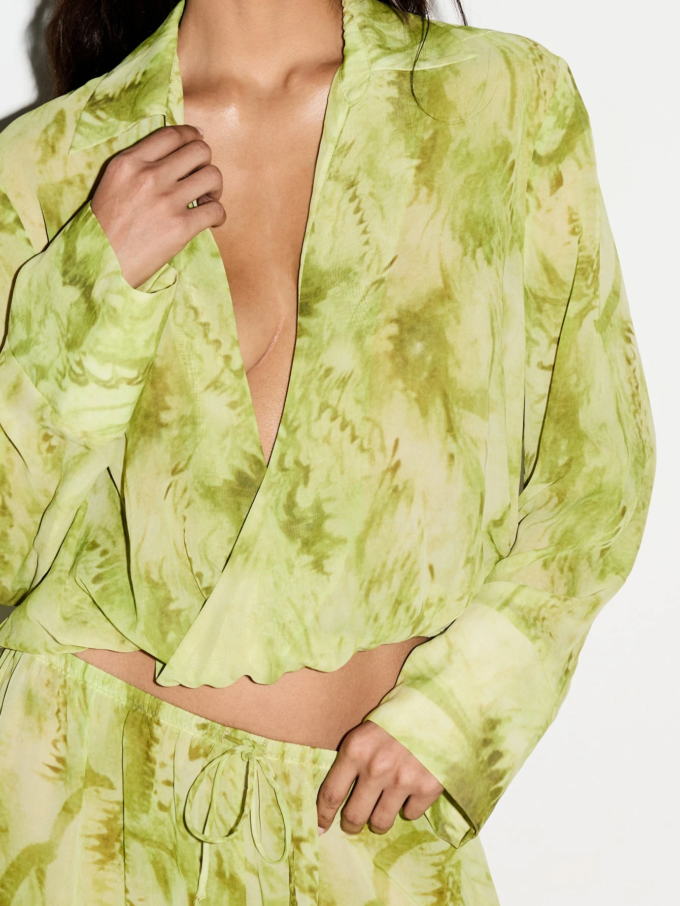KIZN Abstract Printed Drape Plunge Crop Shirt With Bell Sleeves