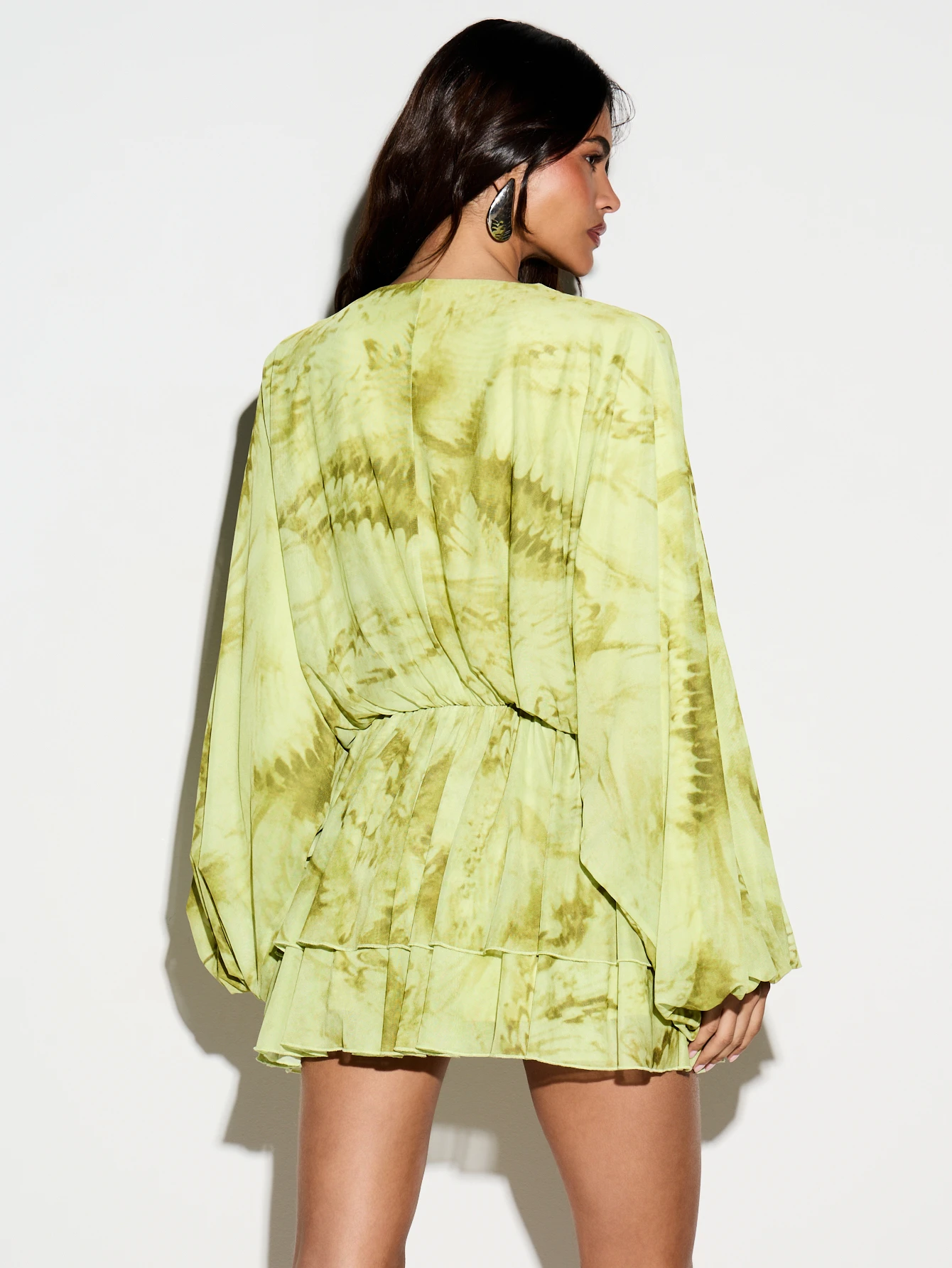 Abstract Printed Plunge Neck Pleated Flippy Mini Dress