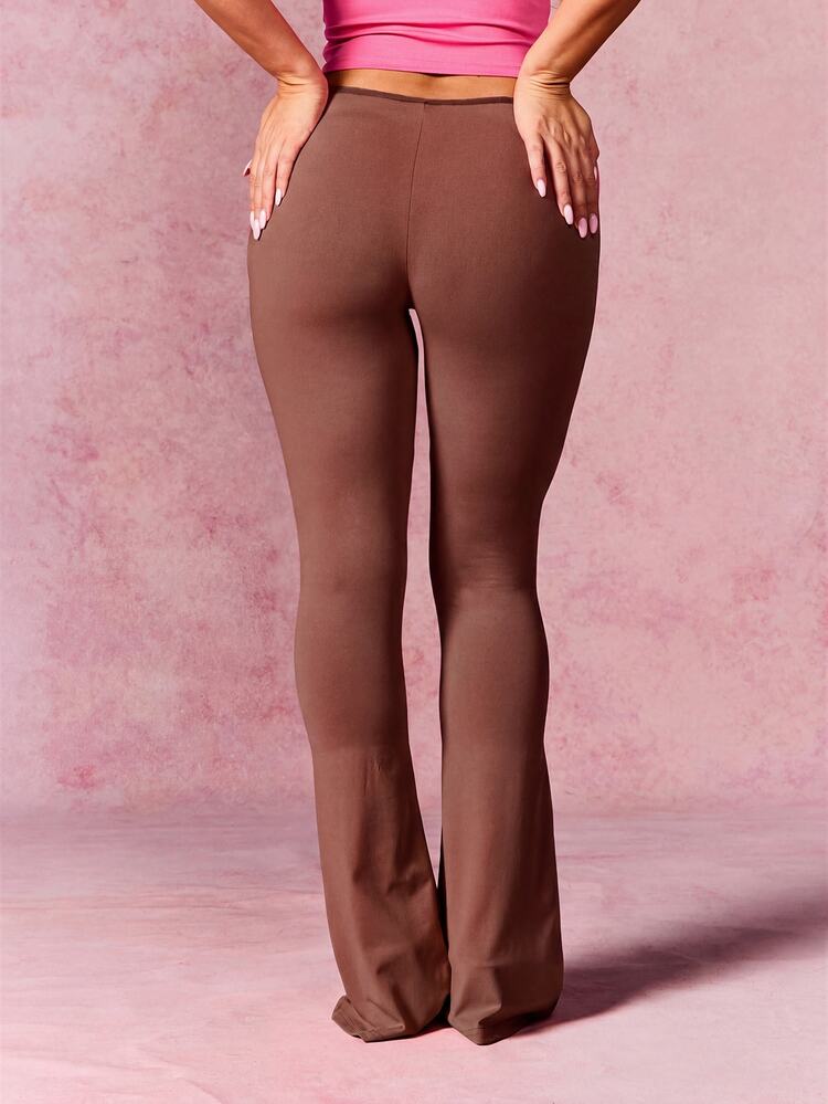 BABYPHAT Cut Out Flare Leggings With Letter Trim Detail And Low Rise Waistband For Night Out