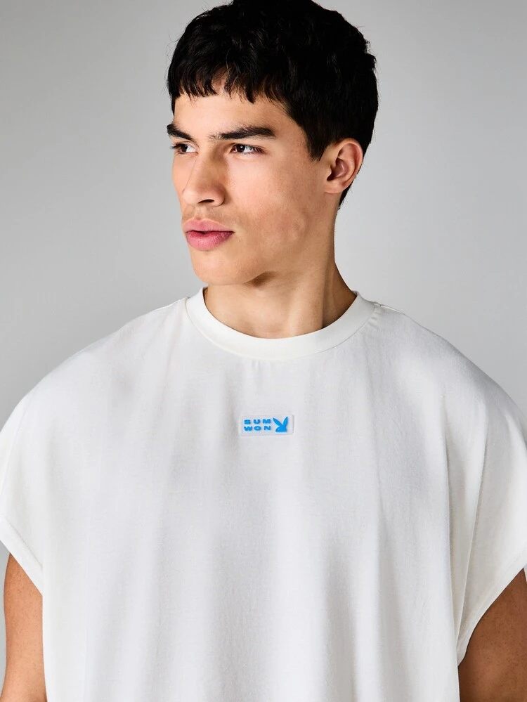 PLAYBOY X SUMWON Camiseta de tirantes oversize con detalles de pespunte en contraste y estampado de logo en la espalda, esenciales de conejito