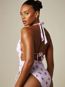 Missguided x Playboy Áo tắm liền thân kiểu yếm cổ chữ V sâu, phối ren hình thỏ, điểm nhấn là logo thỏ và có chi tiết nhún bèo ở hai bên. - Nhiều màu - Xem 3