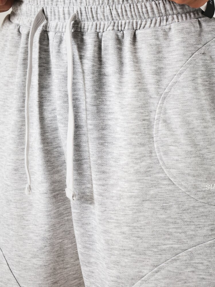 Drawstring Waist Fleece Sweat Shorts With Curved Seam Detail And Side Pockets For Casual Everyday Summer Wear