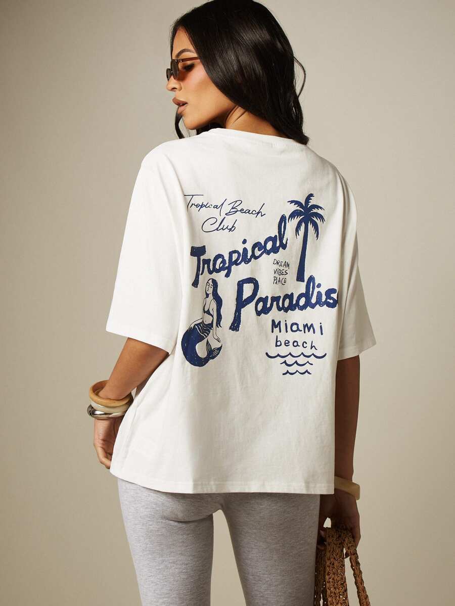 MISSGUIDED Áo thun oversized in hình thiên đường nhiệt đới Miami Beach với hình nàng tiên cá và cây cọ ở mặt sau, cổ tròn, tay ngắn, thích hợp cho mùa hè. - trắng - Xem 1