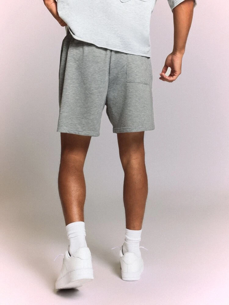 Pantalones cortos con detalle de pinzas y cintura con cordón, de punto jaspeado, para uso casual de verano