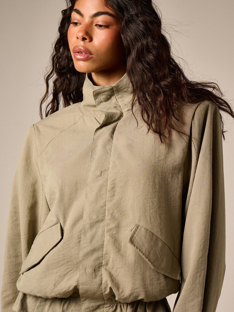 Funnel Neck Jacket With Shoulder Pads And Elasticated Hem