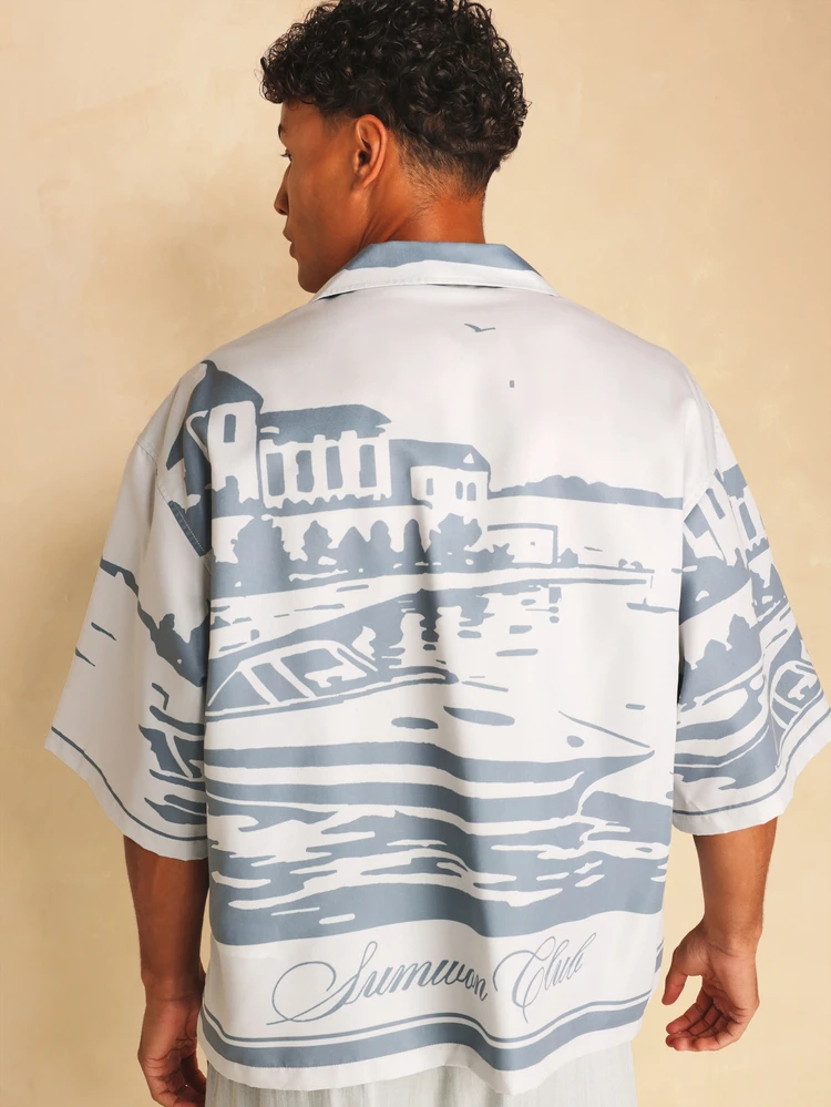 Club Boat Print Revere Collar Short Sleeve Oversized Shirt With Scenic Harbour Graphic And Script Text Detail
