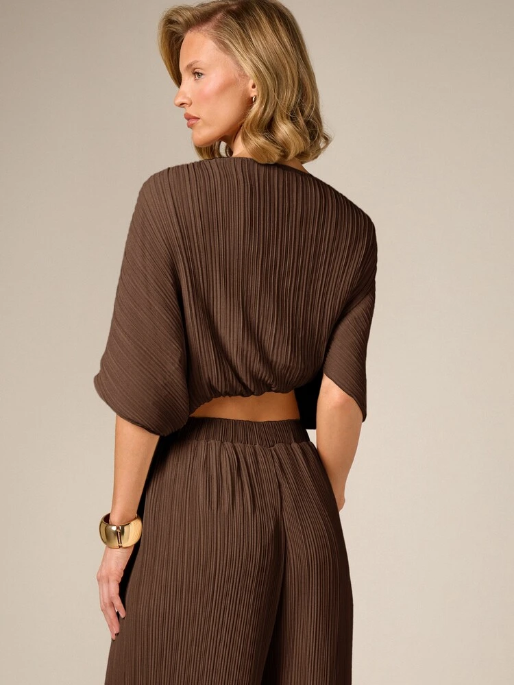 AiiRZ Plisse Asymmetric Off-Shoulder Top With Batwing Sleeves And Elasticated Waist Detail