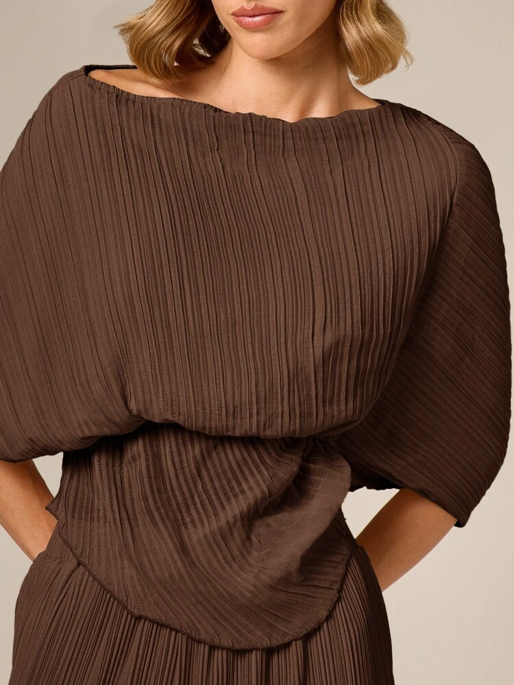 AiiRZ Plisse Asymmetric Off-Shoulder Top With Batwing Sleeves And Elasticated Waist Detail