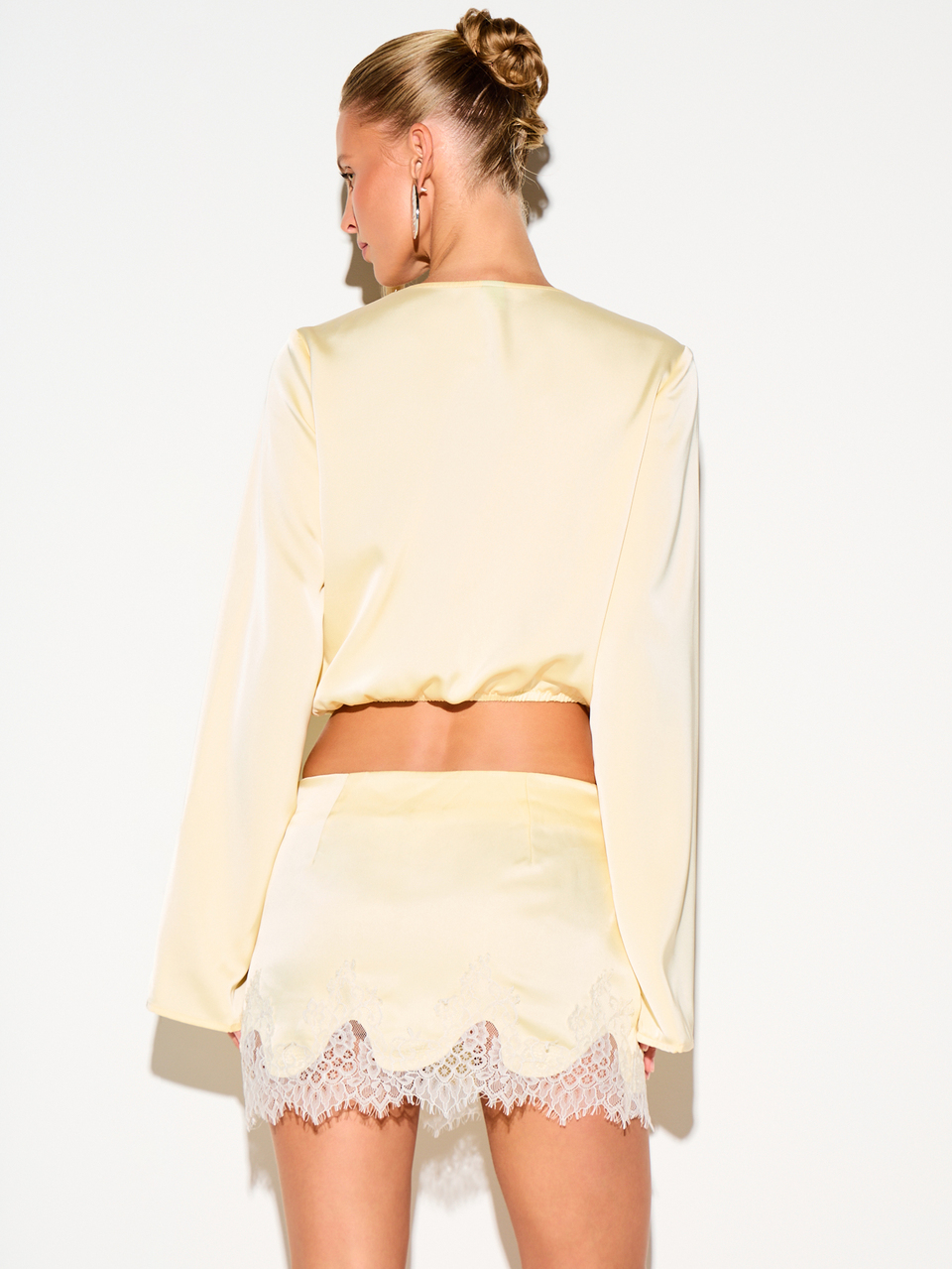 KIZN Satin Mini Skirt With Lace Trim Hem