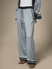 KSTM Celana Palazzo Lebar dengan Motif Geometris, Pinggang Elastis, dan Detail Garis-Garis di Bagian Bawah - MultiWarna - View 4