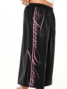 SUMWON WOMEN Wide Leg Culottes Shorts With Cursive Script Side Print And Elastic Waist Streetwear Style - Black - View 6