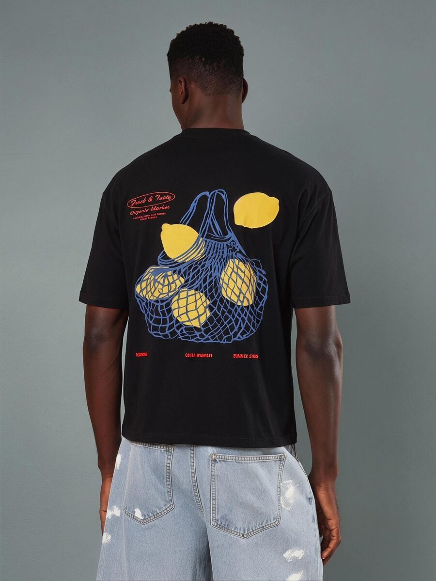SUMWON Regular Oversized Crew Neck Graphic T-Shirt With Lemon Net Bag Back Print And Logo Chest Emblem Summer Casual Tee - Black - View 1