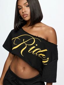 SUMWON WOMEN Off-Shoulder Crop Tee With Diagonal Raw Hem Cut And Gold Script Graphic Print - Black - View 3