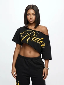 SUMWON WOMEN Off-Shoulder Crop Tee With Diagonal Raw Hem Cut And Gold Script Graphic Print - Black - View 1