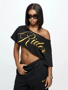 SUMWON WOMEN Off-Shoulder Crop Tee With Diagonal Raw Hem Cut And Gold Script Graphic Print - Black - View 5