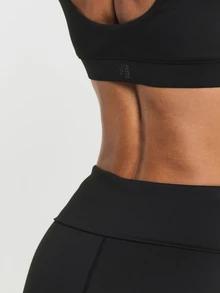 11SKNDS Twist Front Sports Bra Low Impact Padded V-Neck Crop Top Scoop Back Pullover Style With Sweat-Wicking, Stretchy, Breathable & Buttery-Soft, For Gym Workout Studio Summer, Running, Training & Hy-Rox - Black - View 5