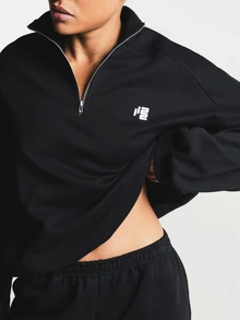 11SKNDS Quarter Zip Pullover Sweatshirt With Open Back Cutout Detail, Long Sleeves, And Small Chest Logo Print, Fall Winter Essential - Black - View 1