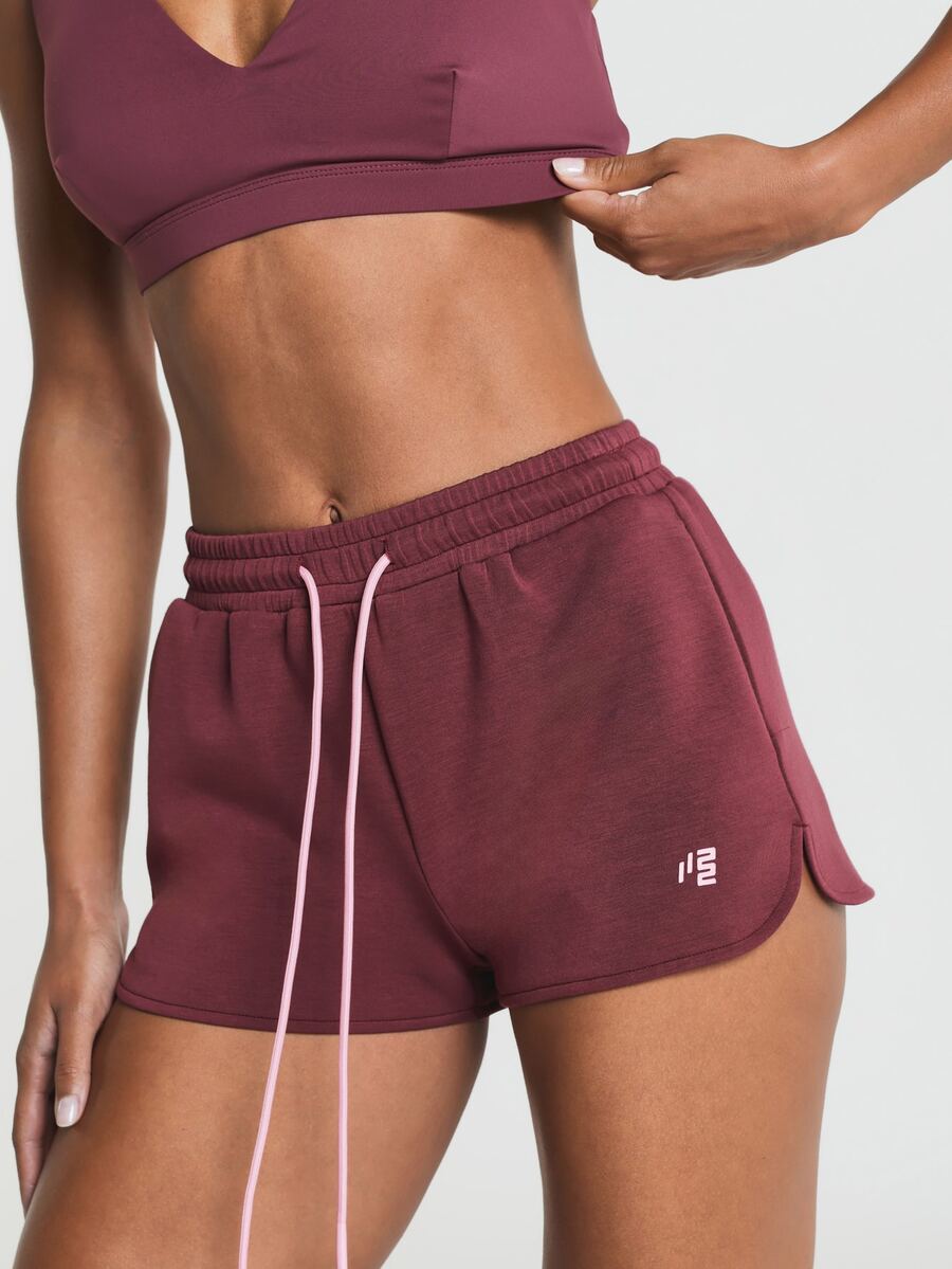 11SKNDS Fleece Sweat Shorts With Elastic Drawstring Waistband, Curved Hem, Side Pockets, Contrast Pink Drawcord, Mini Logo Detail, Casual Everyday Loungewear - Burgundy - View 1