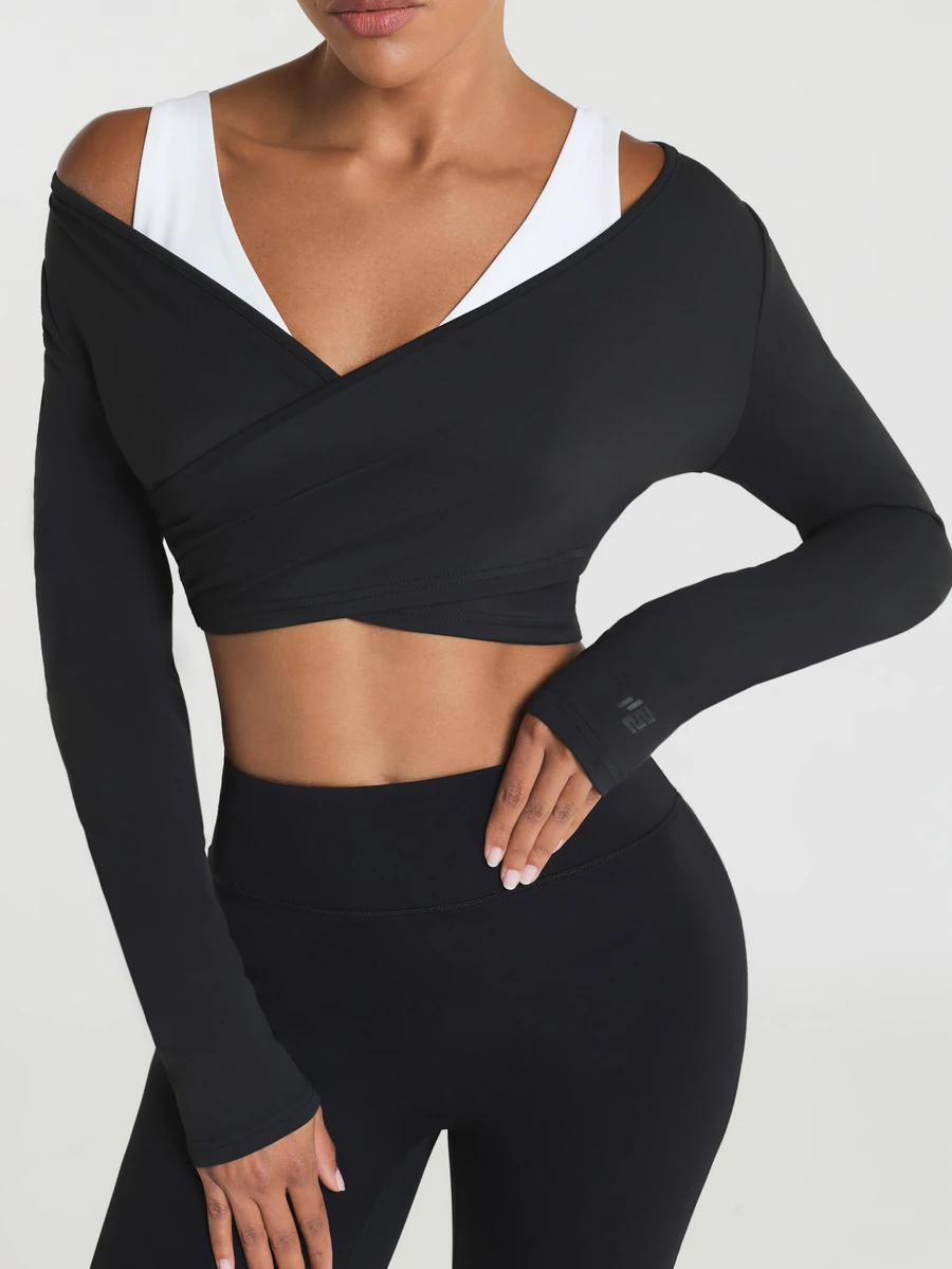 11SKNDS Long Sleeve Cold Shoulder Wrap Crop Top With Deep V Neckline, Crossover Front Design, Thumbhole Cuffs, And Contrast Strap Detail For Active Training With Sweat-Wicking, Stretchy, Breathable, Quick-Dry & Buttery-Soft, For Gym Workout Fitness Yoga Pilates Studio, Running & Hy-Rox - Black - View 1