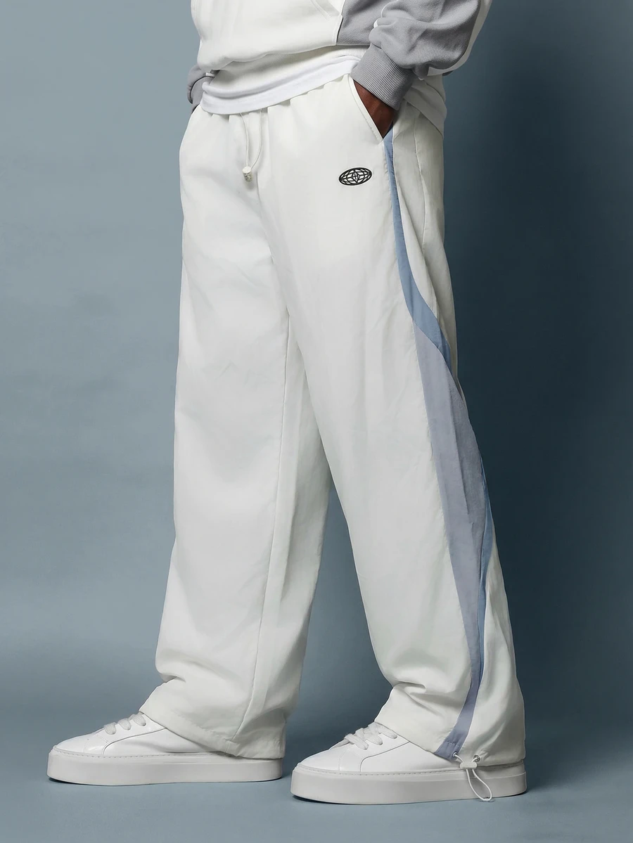 SUMWON Nylon Parachute Track Pants With Color Block Side Panel Detail And Drawstring Hem - White - View 1
