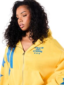 SUMWON WOMEN Studios Oversized Full-Zip Grafik-Hoodie mit Stern-Muster-Ärmeln und Streifen-Detail - Gelb - Übersicht 5