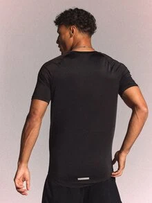 SUMWON Raglan Fitted Crew Neck Short Sleeve Sports Tee With Reflective Detail And Brand Logo Print - Black - View 4